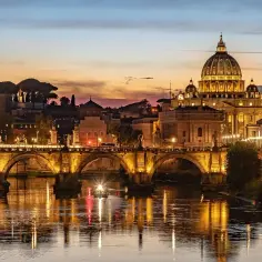 Rzym o zmierzchu: Bazylika św. Piotra i Ponte Sant'Angelo. Czy do Watykanu potrzebny jest paszport? Nie, jeśli jesteś w Rzymie!